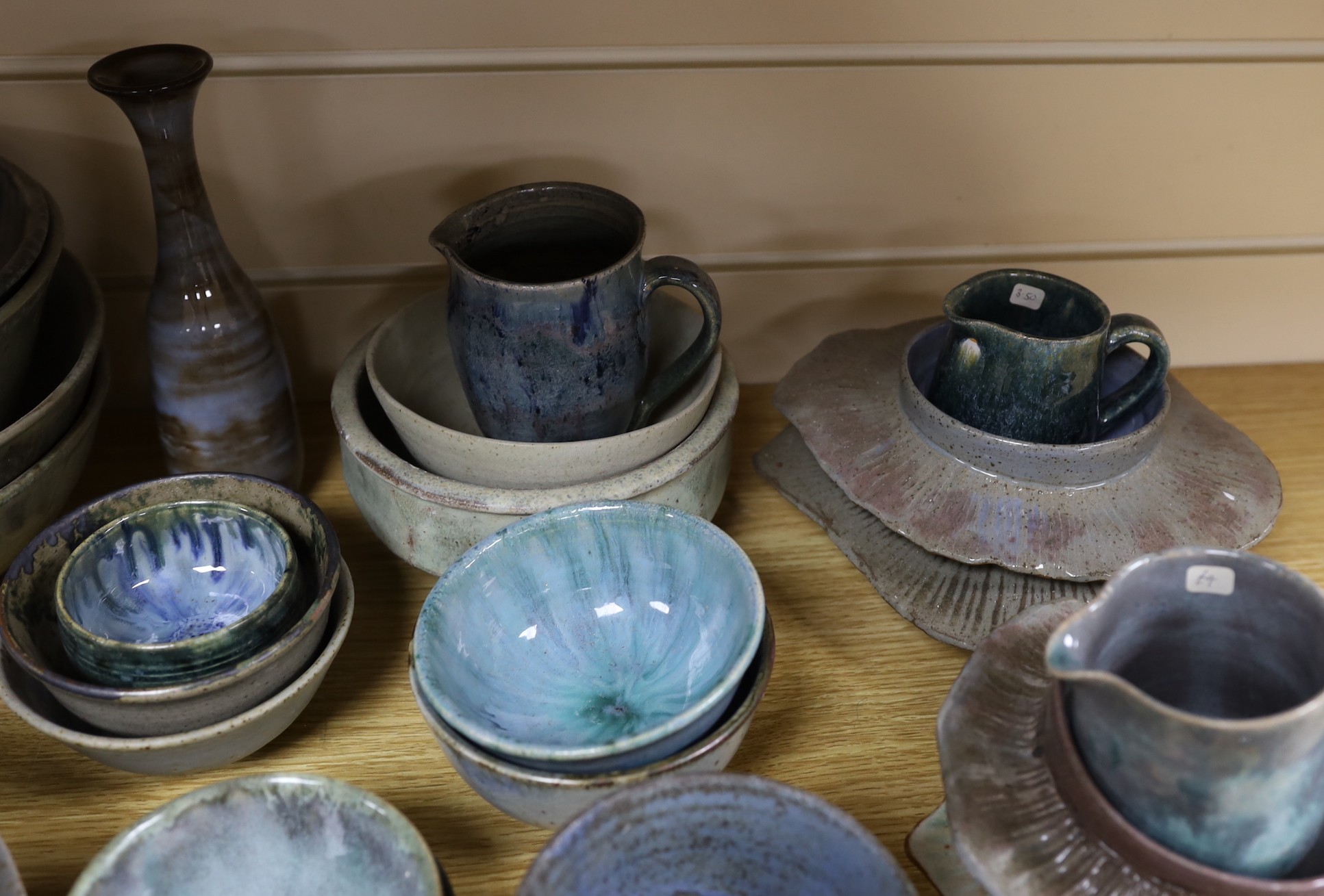 A collection of studio pottery bowls jugs and dishes